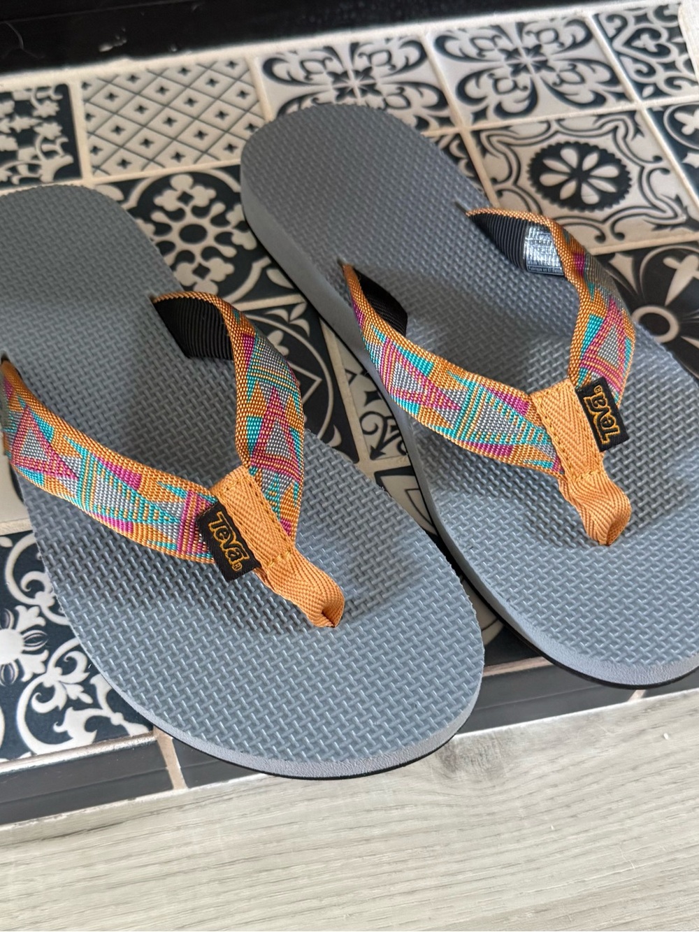 Teva Black Strap Sandal with Orange Trim